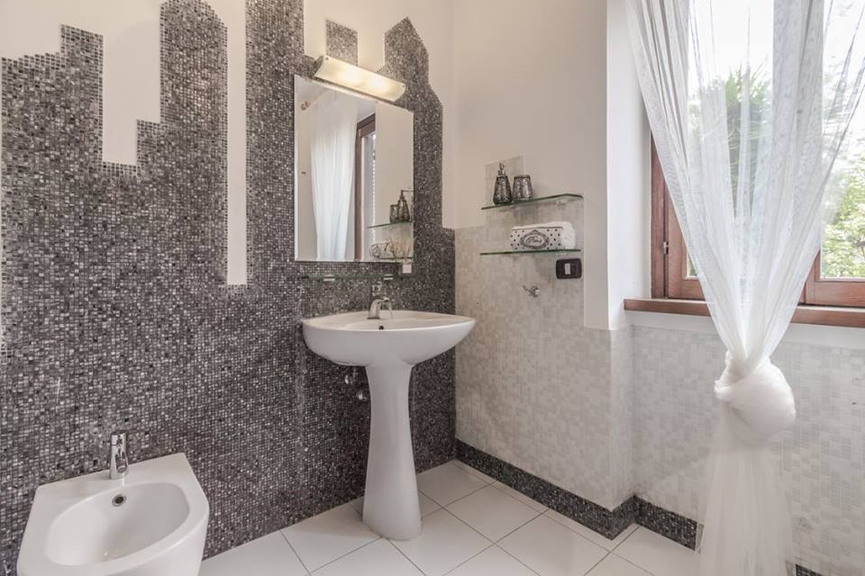 Angela Cingolani Architetto con Roberta Anfora Casa Abitata dopo - bagno